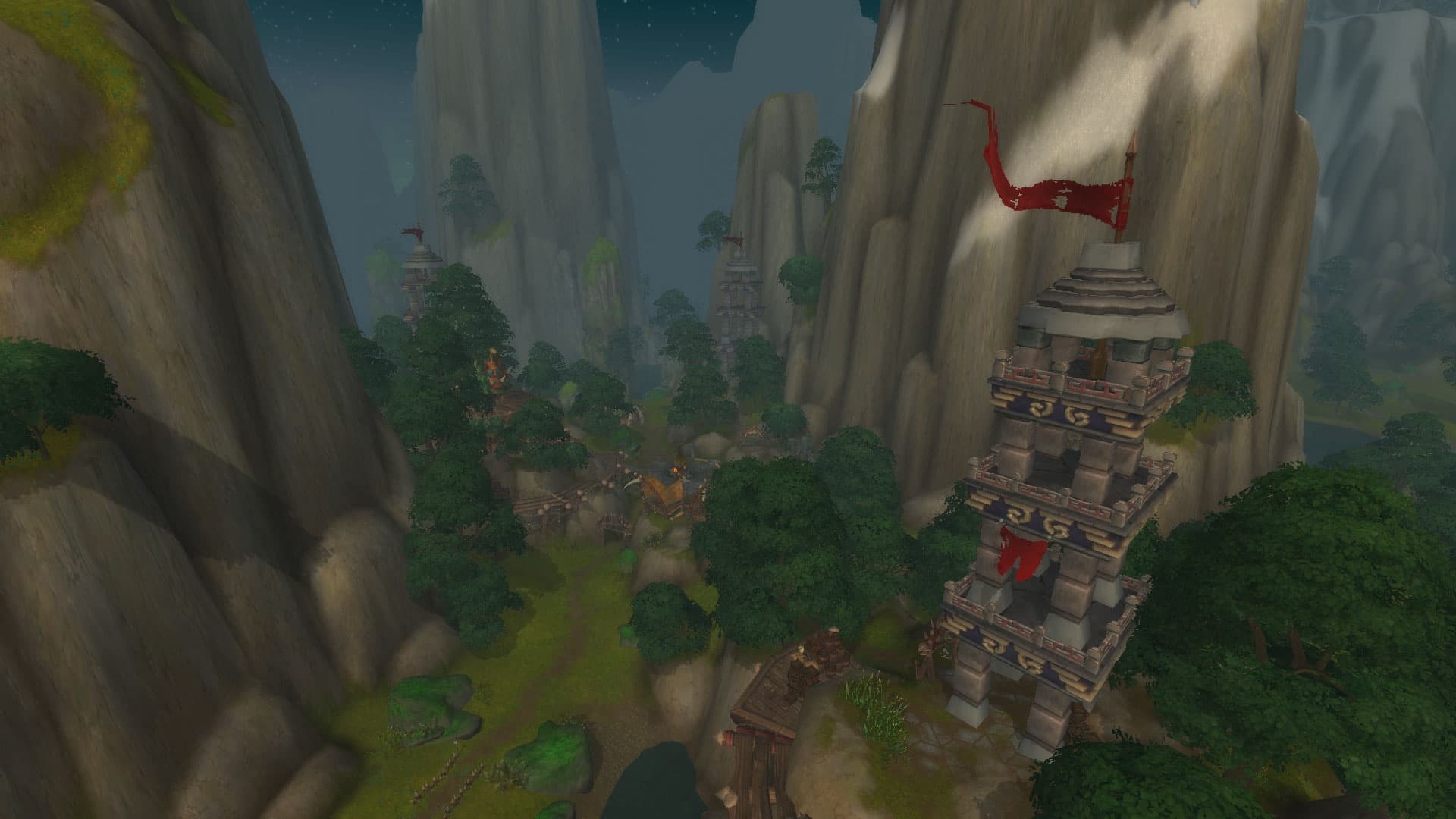 Horde towers and a forest settlement between the immense cliffs of Druk'Thar